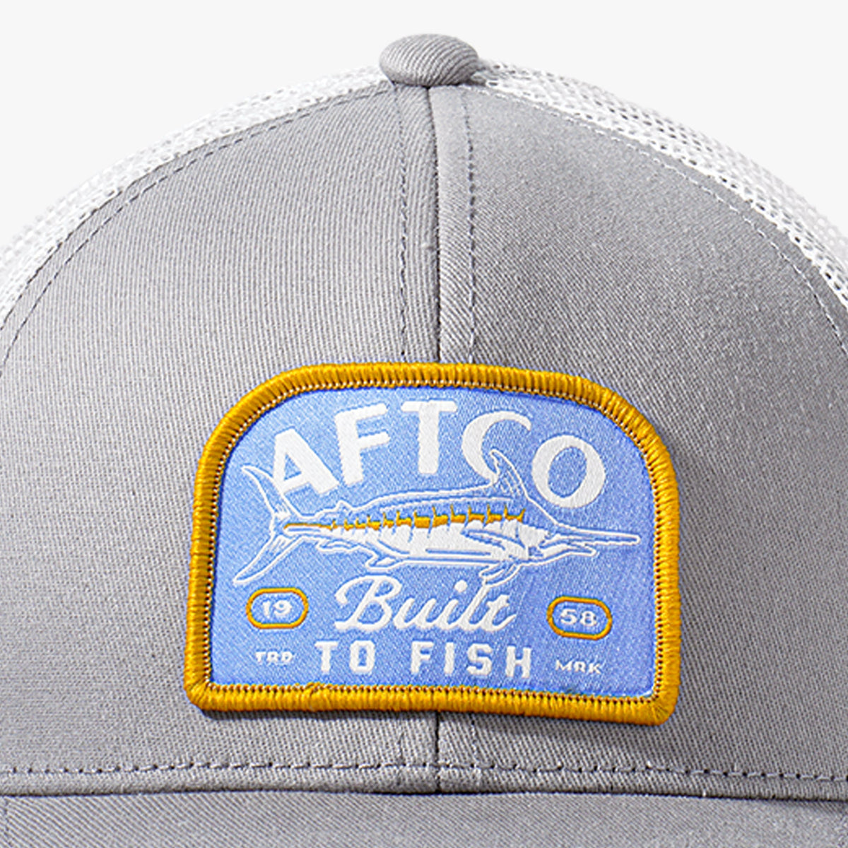 Silver Youth Trilogy Fishing Trucker Hat / AFTCO Latest