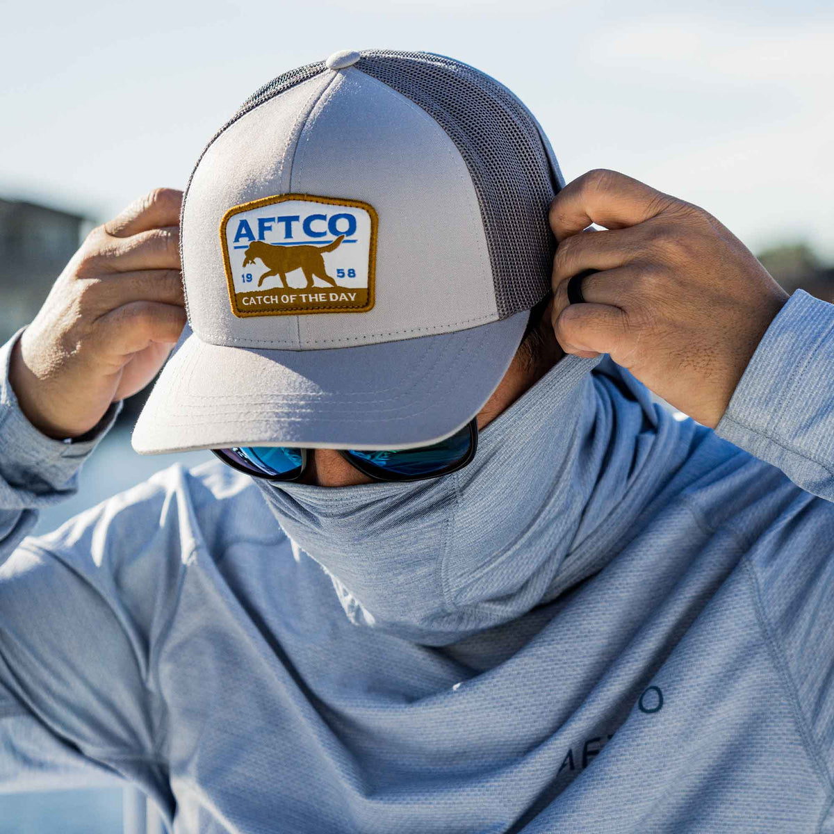 Blue Fetch Fishing Trucker Hat / AFTCO Signature